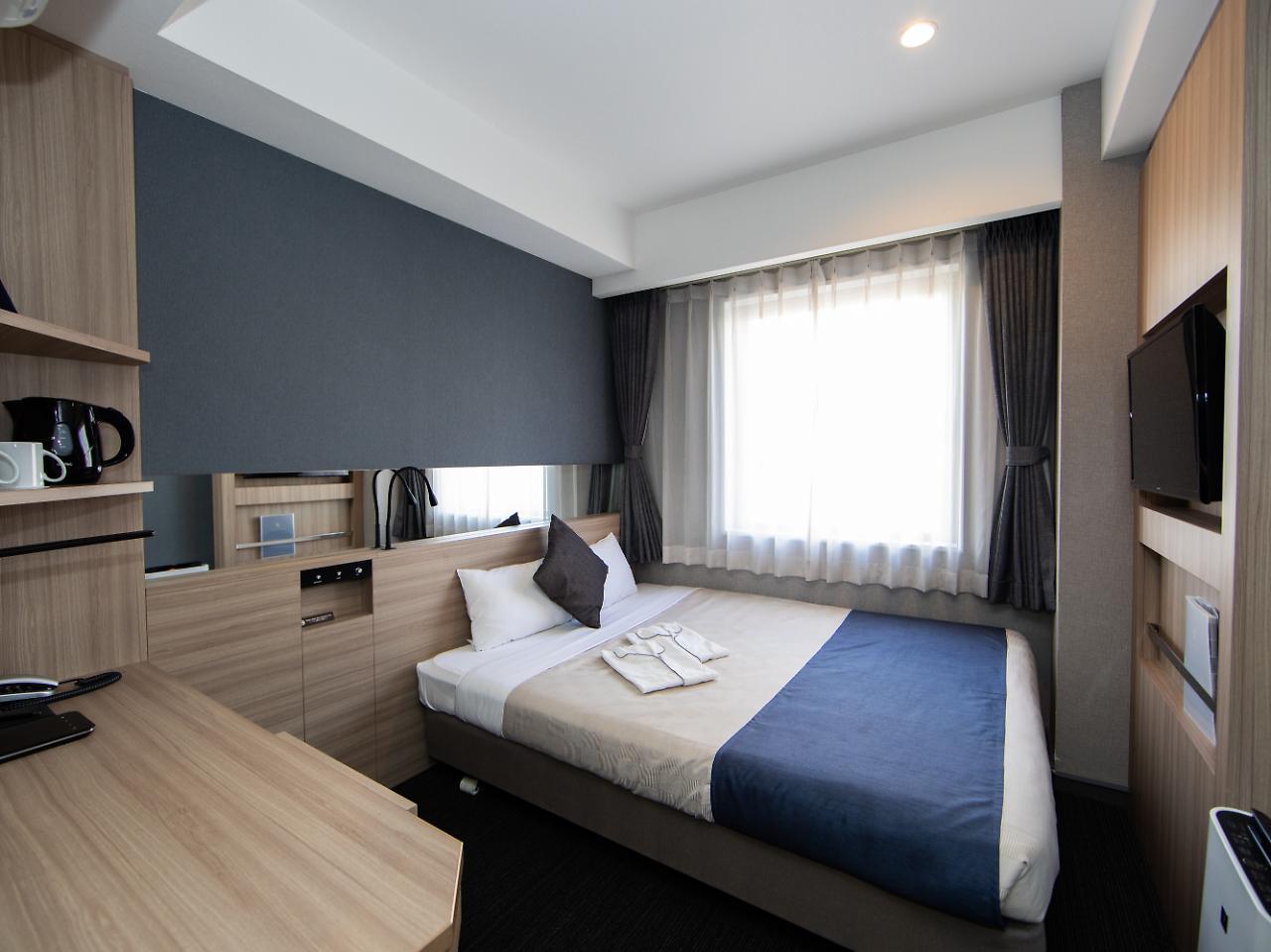 Quintessa Shinsaibashi Comic & Books Hotel Ōsaka