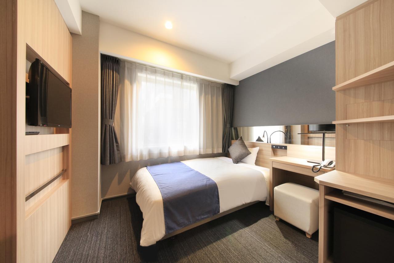 Quintessa Shinsaibashi Comic & Books Hotel Ōsaka